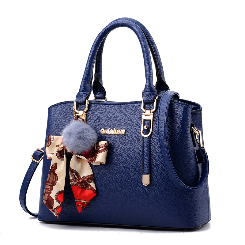 Dark blue tote with decorative scarf